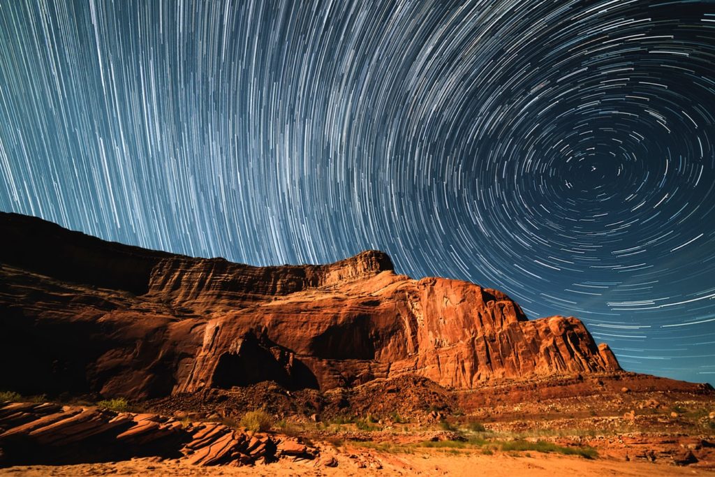 a starry night over some mesas